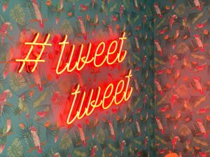 twitter ads neon "tweet tweet" sign
