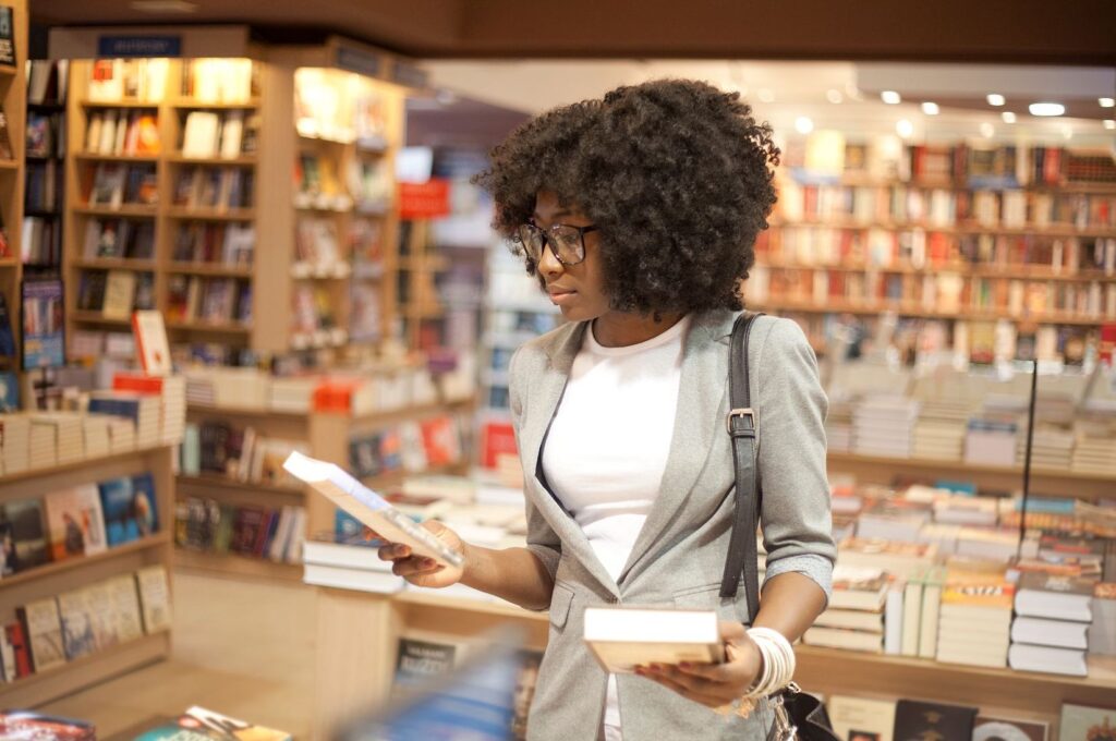 Woman buying books on digital marketing